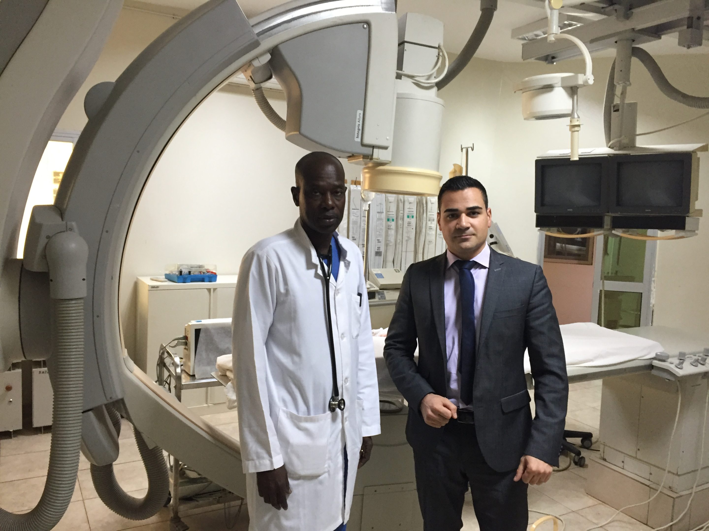 Two people in a cardiac catheterization laboratory