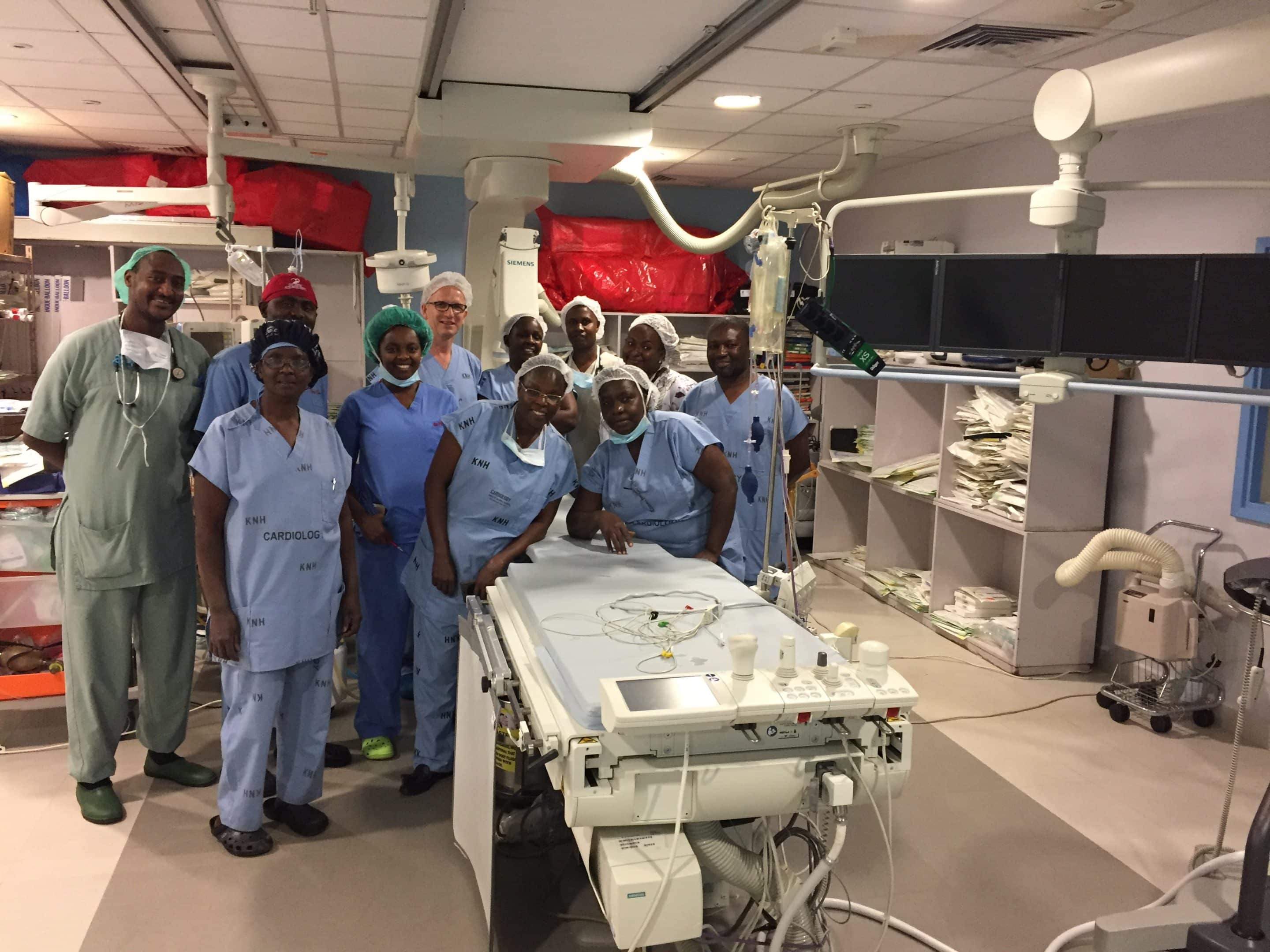 Medical professionals in a cardiac catheterization laboratory